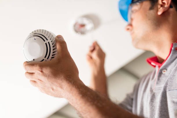 Lighting installation repair Smoke detector installation Smoke detector installation istockphoto 1036759422 612x612 1